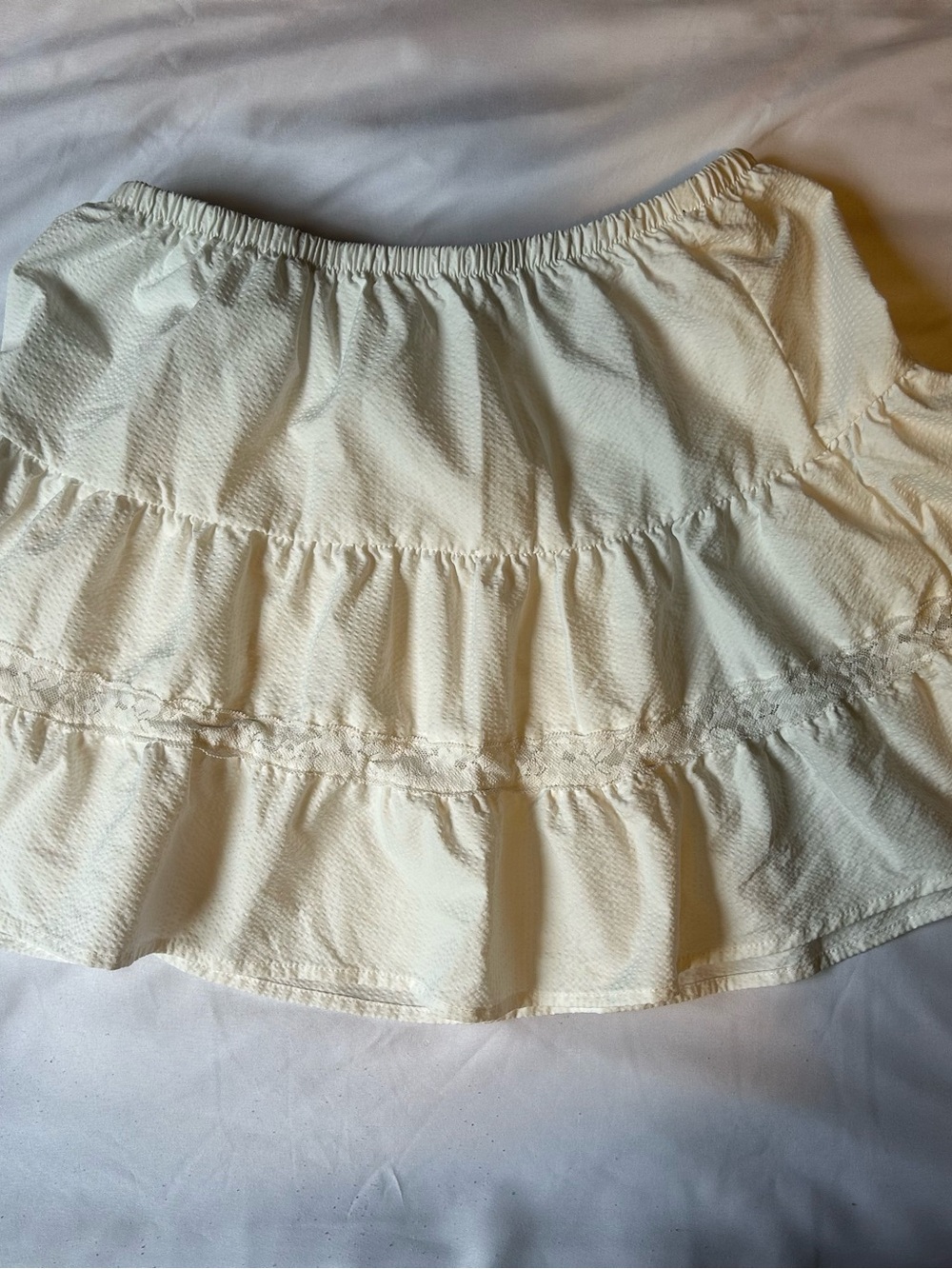 Ivory tiered mini skirt